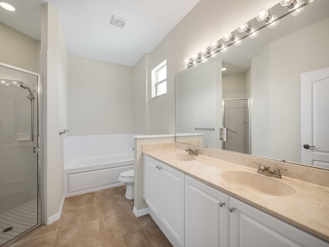 full bathroom with toilet, vanity, plus walk in shower, and tile patterned flooring