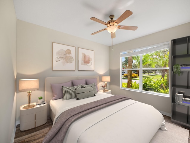 bedroom featuring hardwood / wood-style floors and ceiling fan