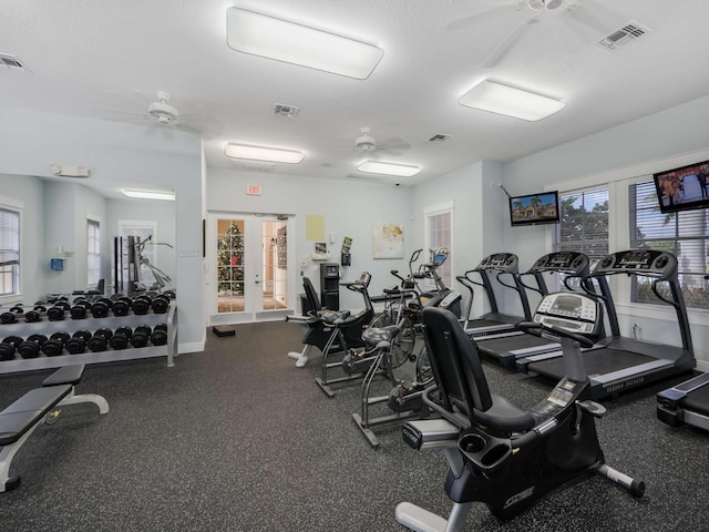 gym with ceiling fan