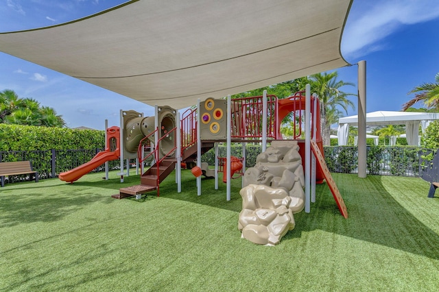 view of jungle gym with a yard