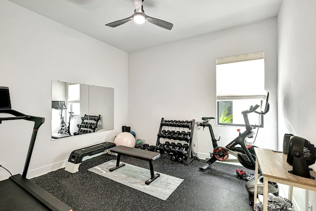 exercise room with ceiling fan