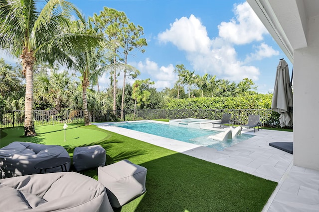 view of swimming pool with an in ground hot tub and a patio