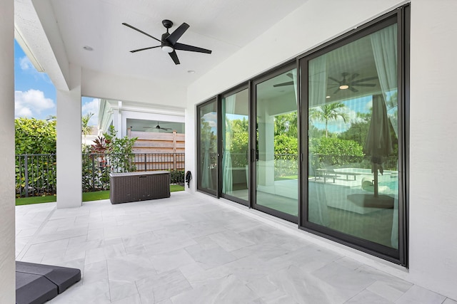 view of patio with ceiling fan