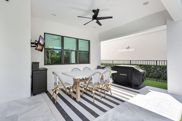 view of patio featuring ceiling fan and a grill