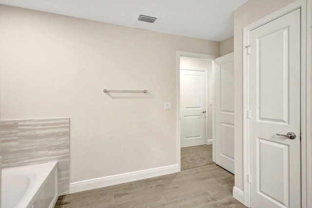 bathroom featuring a bathing tub