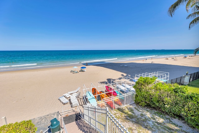 view of water feature with a beach view