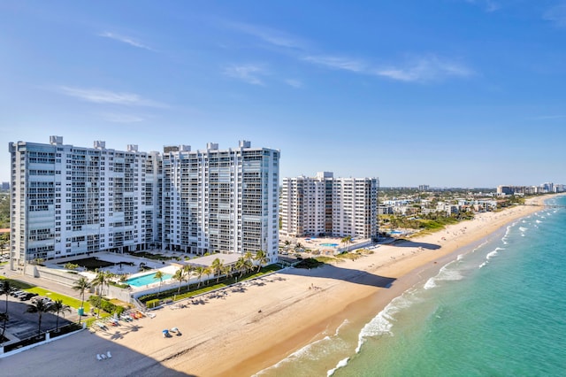 aerial view featuring a water view and a beach view