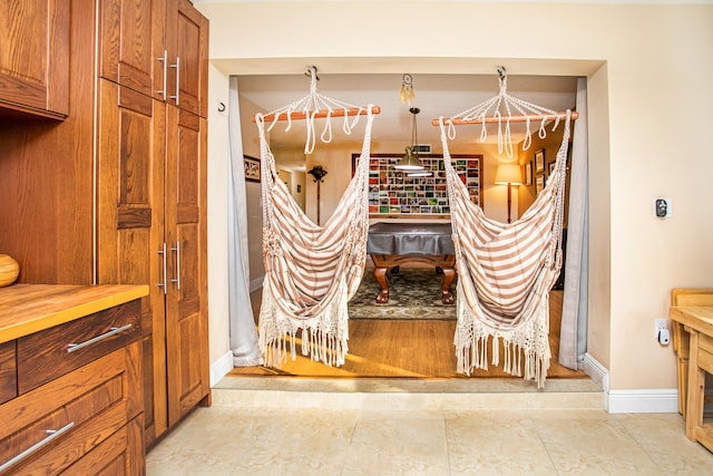 interior details featuring tile patterned flooring