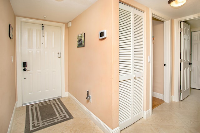 interior space with light tile patterned floors