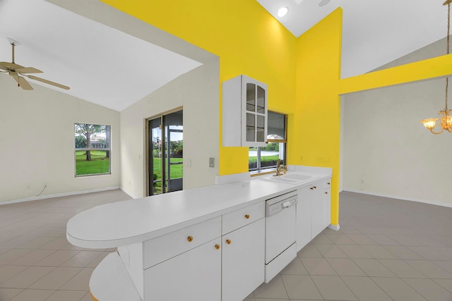 kitchen with dishwasher, white cabinetry, and a healthy amount of sunlight