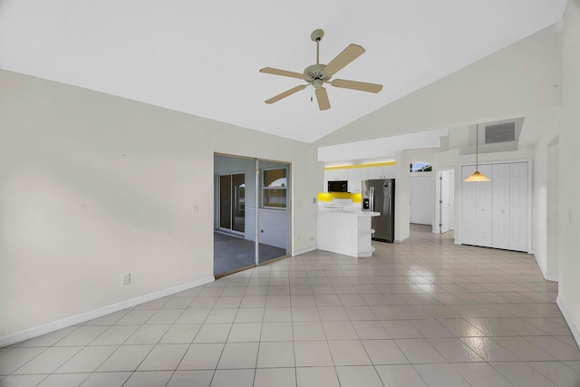 unfurnished living room featuring ceiling fan, high vaulted ceiling, and light tile patterned floors