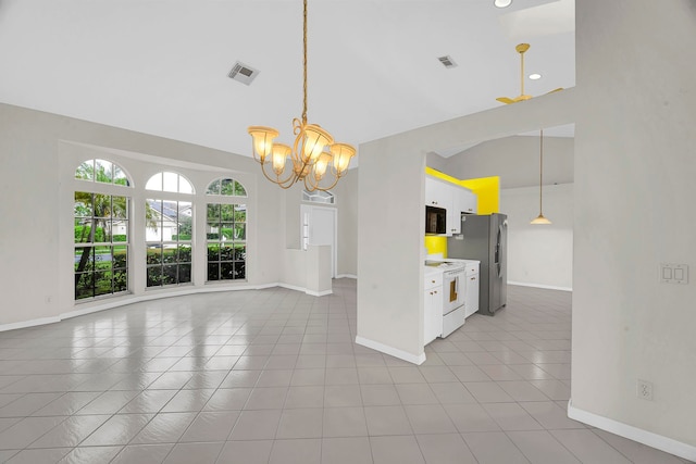 interior space with white cabinets, hanging light fixtures, stainless steel fridge with ice dispenser, a chandelier, and white range with electric cooktop