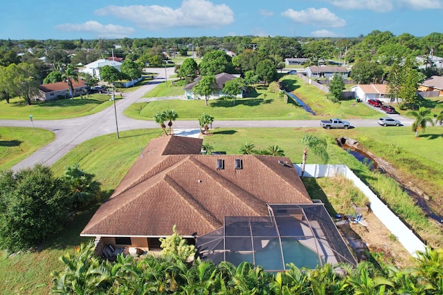 birds eye view of property with a residential view
