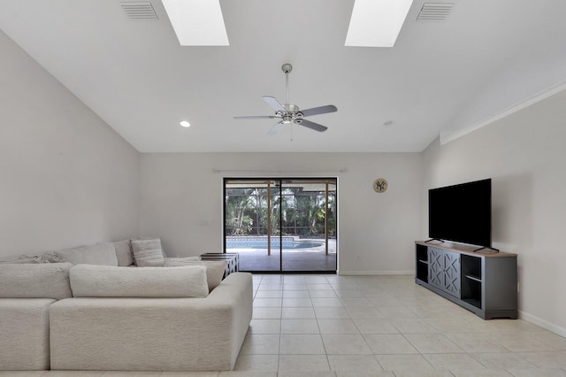 living room with baseboards, ceiling fan, and visible vents