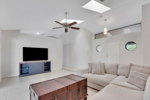 tiled living room with lofted ceiling and ceiling fan