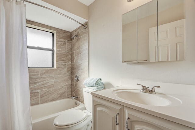 full bathroom featuring vanity, shower / tub combo with curtain, and toilet