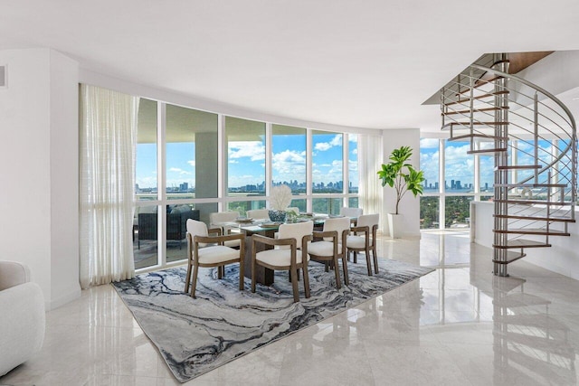 dining space with expansive windows