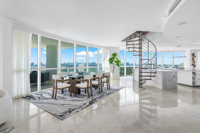 dining room with floor to ceiling windows