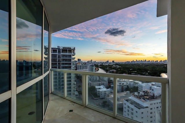 view of balcony at dusk