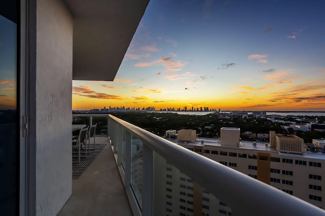 view of balcony at dusk