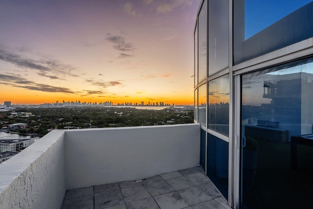 view of balcony at dusk