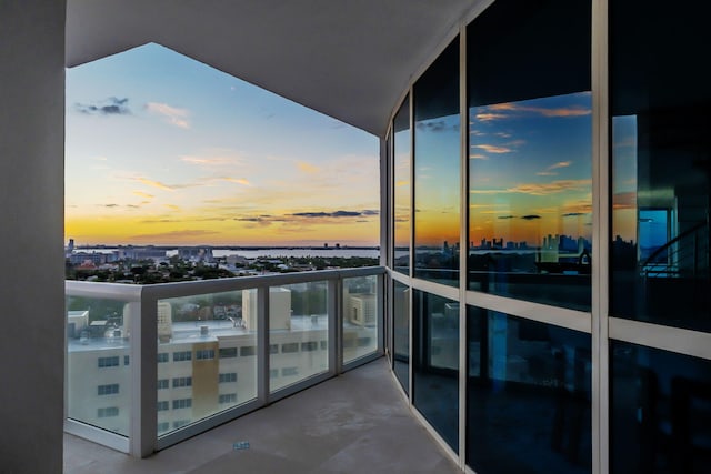 view of balcony at dusk