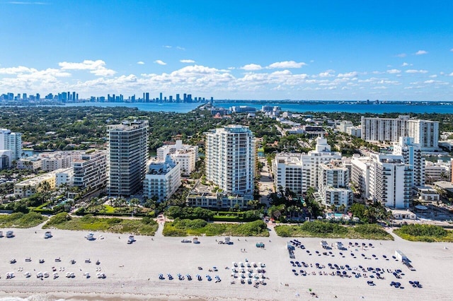 aerial view featuring a beach view and a water view