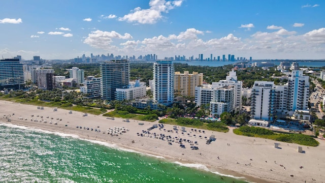 aerial view featuring a beach view and a water view