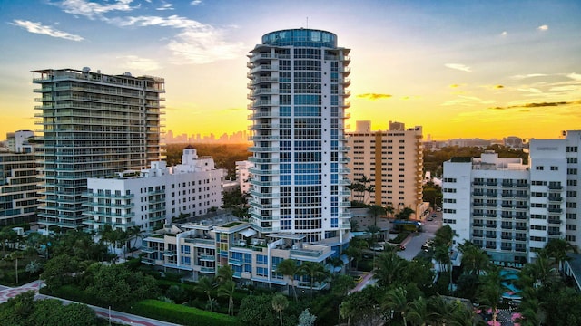 view of outdoor building at dusk