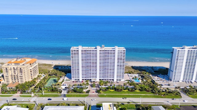 aerial view with a view of city, a water view, and a beach view