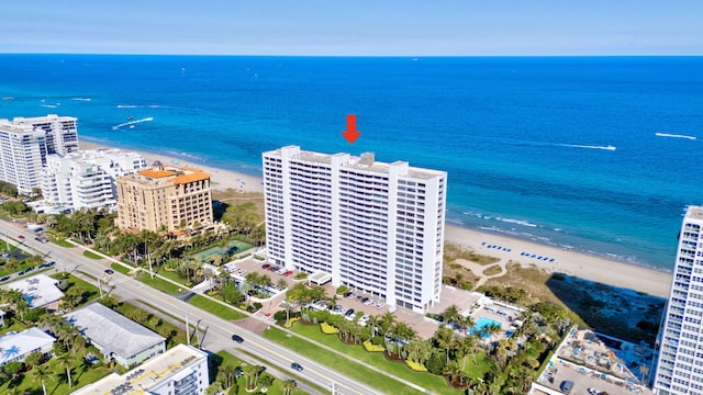 bird's eye view featuring a beach view, a water view, and a city view