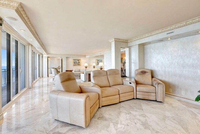 living area featuring marble finish floor, visible vents, crown molding, and baseboards