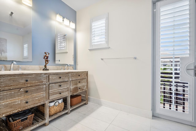 bathroom with vanity and tile patterned flooring