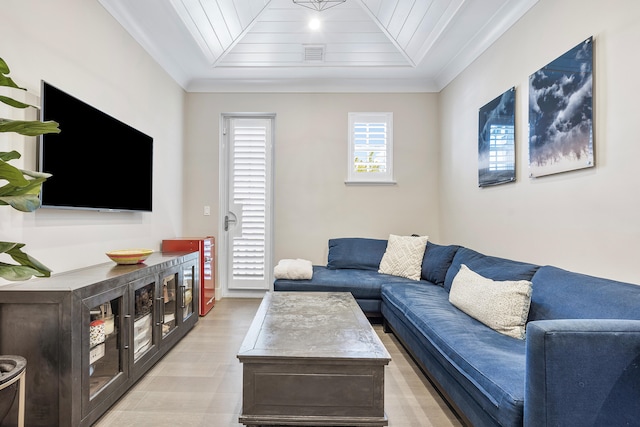 living room with light hardwood / wood-style floors, ornamental molding, and wooden ceiling