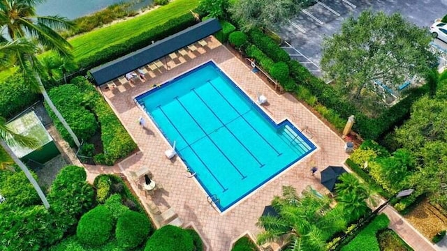 view of swimming pool featuring a patio area