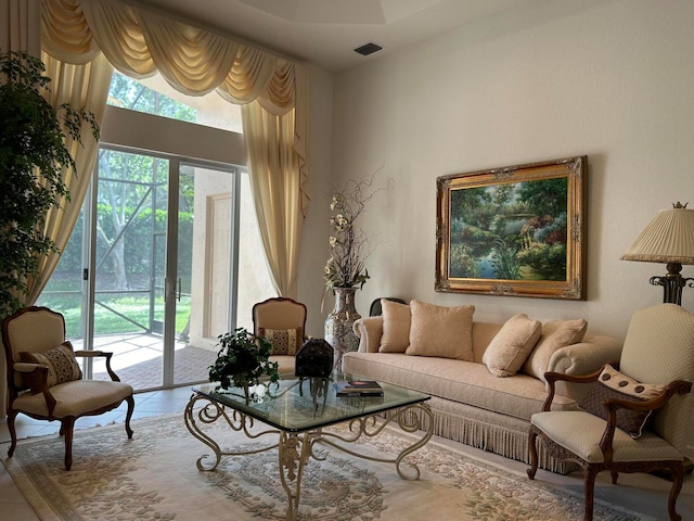 sitting room with tile patterned floors