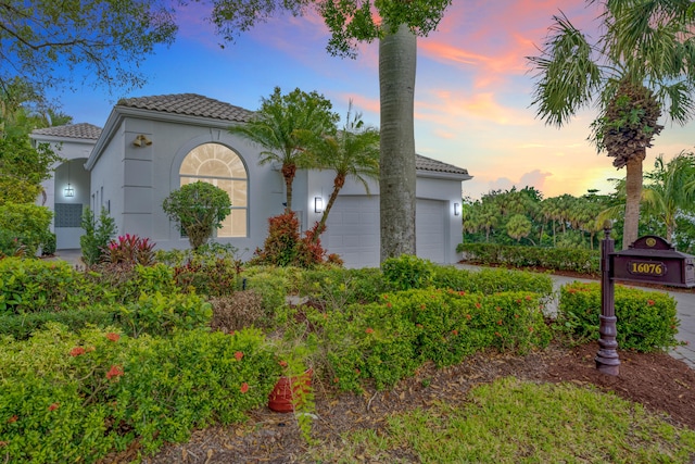 view of front of house with a garage