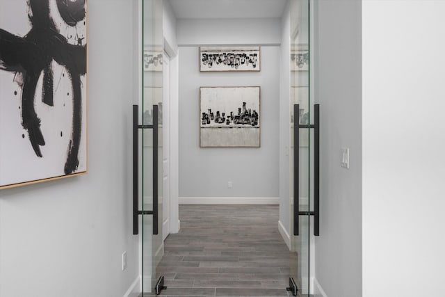 hallway featuring dark wood-type flooring