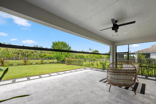 view of patio featuring ceiling fan