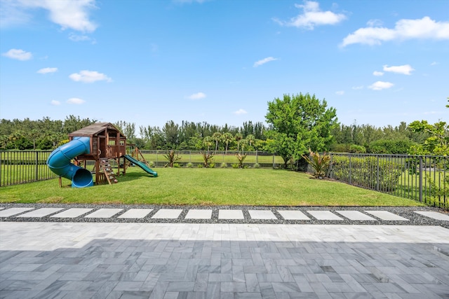 view of play area featuring a yard