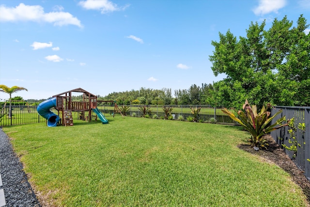 view of yard with a playground