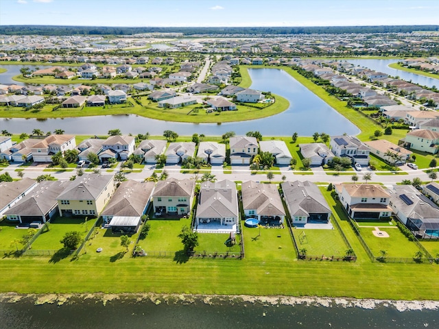 drone / aerial view with a water view