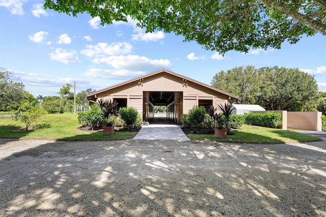 view of front of home with an outdoor structure