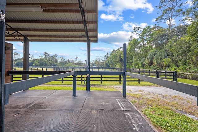 view of patio / terrace with a rural view