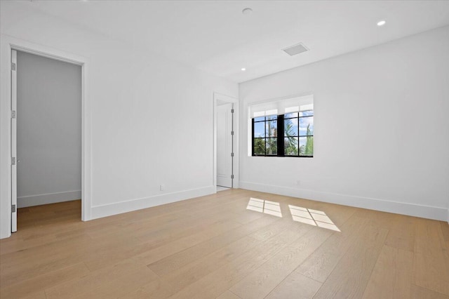 empty room featuring light hardwood / wood-style floors