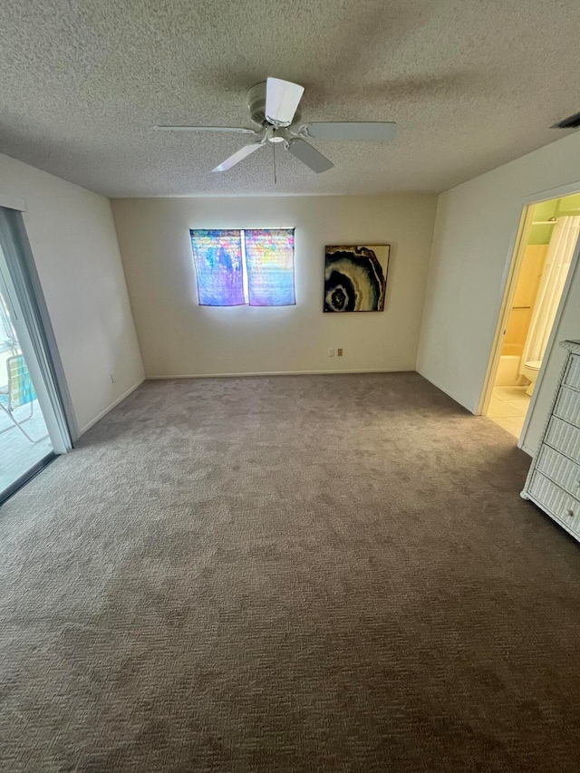 unfurnished room with carpet, a textured ceiling, and ceiling fan