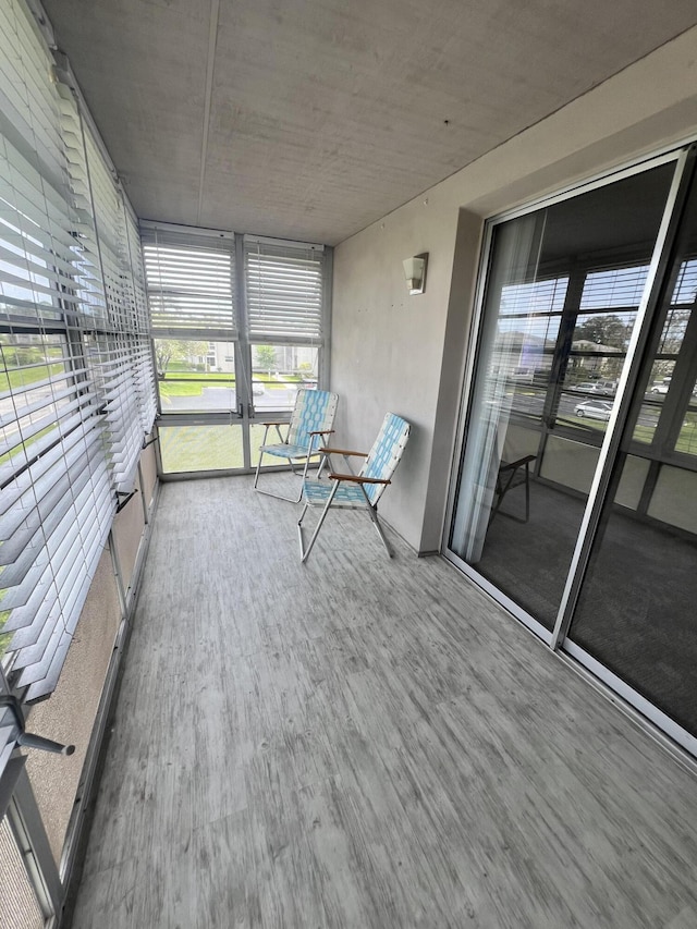 13 Lake Vista Trl Unit 205, Port Saint Lucie, FL 34952 - unfurnished sunroom featuring healthy amount of natural light