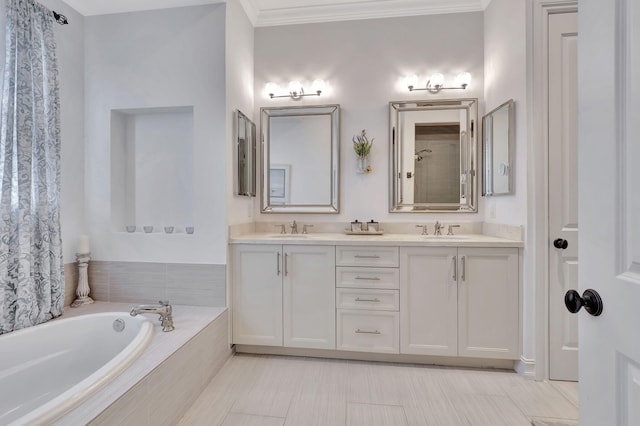 bathroom featuring vanity, a relaxing tiled tub, tile patterned floors, and ornamental molding