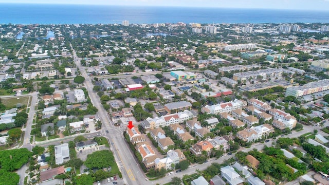 drone / aerial view with a water view