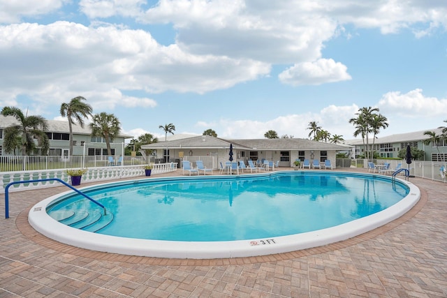 view of pool featuring a patio